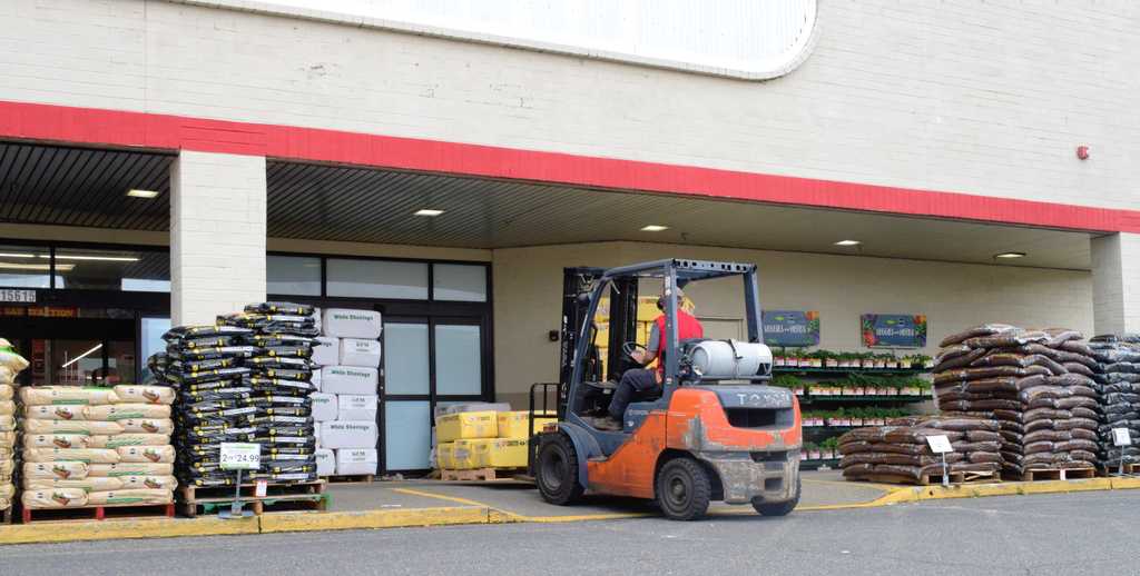 A forklift driver loading